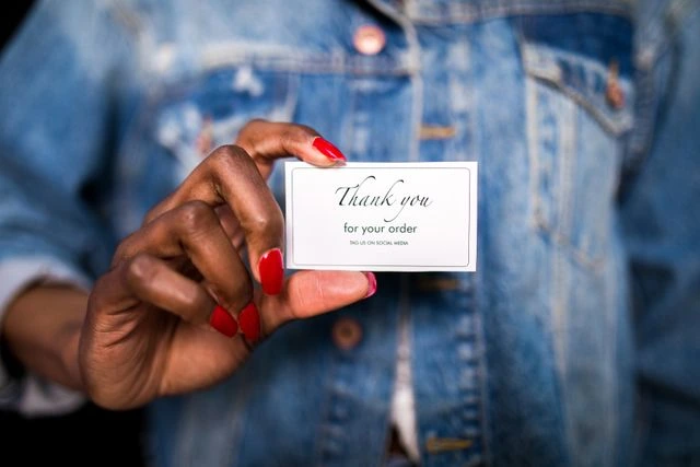 une carte avec marqué Thank You