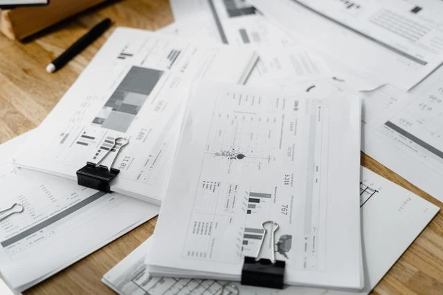 des stats sur des feuilles papier